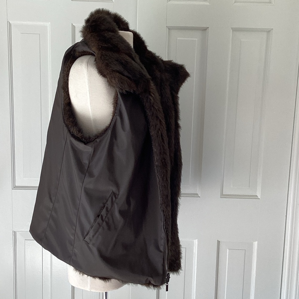 Brown Faux Fur Vest Reversible to A satin type fabric.  Pockets on each side